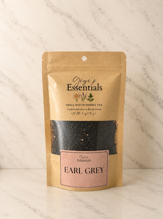 Gigi's Essentials Earl Grey tea package on a marble background